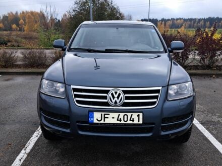 Сірий Фольксваген Туарег, об'ємом двигуна 3 л та пробігом 394 тис. км за 6000 $, фото 1 на Automoto.ua