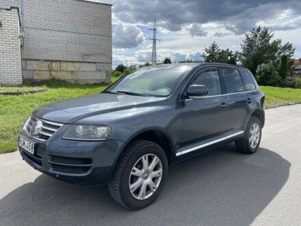 Сірий Фольксваген Туарег, об'ємом двигуна 3 л та пробігом 272 тис. км за 5450 $, фото 1 на Automoto.ua