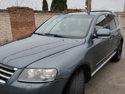 Сірий Фольксваген Туарег, об'ємом двигуна 0 л та пробігом 352 тис. км за 6904 $, фото 1 на Automoto.ua