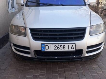 Серый Фольксваген Туарег, объемом двигателя 2.5 л и пробегом 260 тыс. км за 7600 $, фото 1 на Automoto.ua