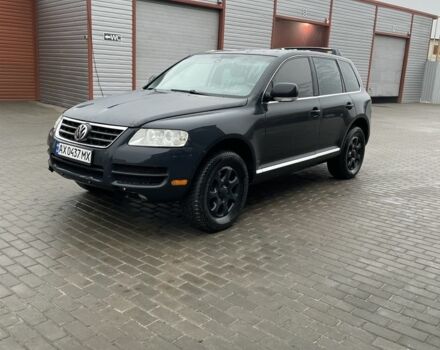 Серый Фольксваген Туарег, объемом двигателя 3.6 л и пробегом 295 тыс. км за 5500 $, фото 1 на Automoto.ua