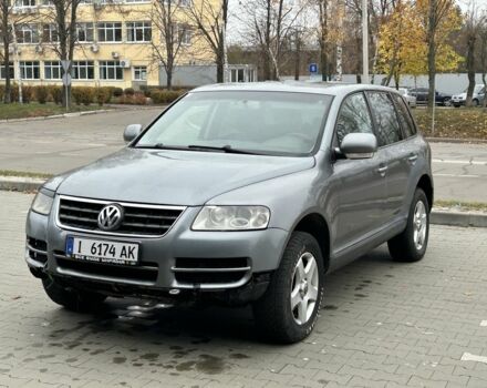 Серый Фольксваген Туарег, объемом двигателя 2.5 л и пробегом 300 тыс. км за 3850 $, фото 1 на Automoto.ua