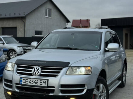 Сірий Фольксваген Туарег, об'ємом двигуна 3 л та пробігом 295 тис. км за 9700 $, фото 1 на Automoto.ua