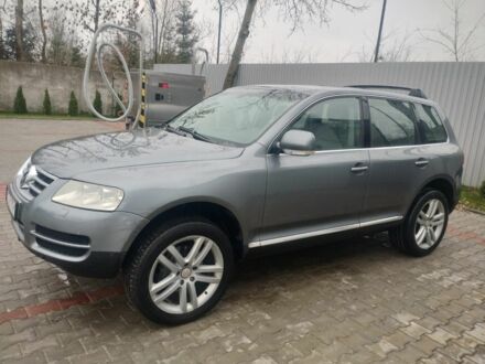 Сірий Фольксваген Туарег, об'ємом двигуна 3 л та пробігом 270 тис. км за 5700 $, фото 1 на Automoto.ua