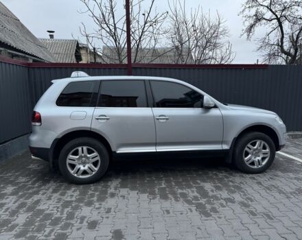 Серый Фольксваген Туарег, объемом двигателя 3.6 л и пробегом 224 тыс. км за 11700 $, фото 1 на Automoto.ua