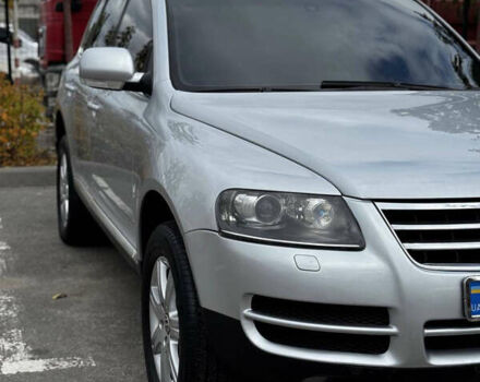 Серый Фольксваген Туарег, объемом двигателя 3.19 л и пробегом 295 тыс. км за 8000 $, фото 1 на Automoto.ua