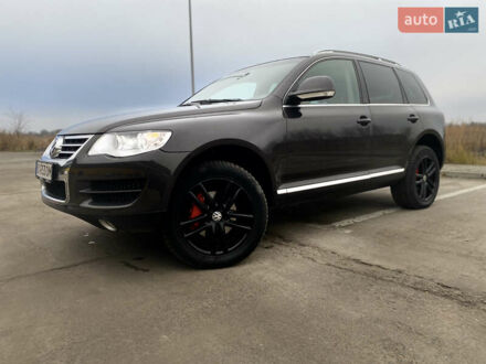 Серый Фольксваген Туарег, объемом двигателя 3 л и пробегом 264 тыс. км за 13200 $, фото 1 на Automoto.ua
