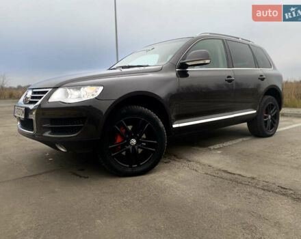 Сірий Фольксваген Туарег, об'ємом двигуна 3 л та пробігом 264 тис. км за 13200 $, фото 1 на Automoto.ua