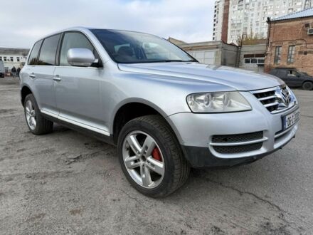 Сірий Фольксваген Туарег, об'ємом двигуна 3 л та пробігом 289 тис. км за 4000 $, фото 1 на Automoto.ua