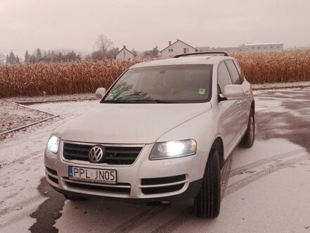 Серый Фольксваген Туарег, объемом двигателя 3 л и пробегом 224 тыс. км за 2800 $, фото 1 на Automoto.ua
