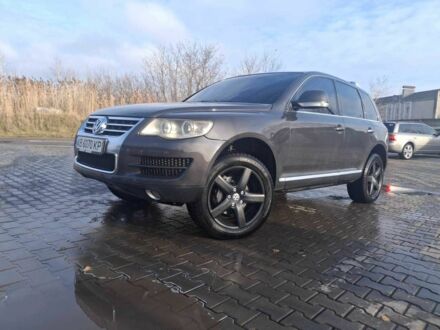 Сірий Фольксваген Туарег, об'ємом двигуна 3 л та пробігом 323 тис. км за 12700 $, фото 1 на Automoto.ua