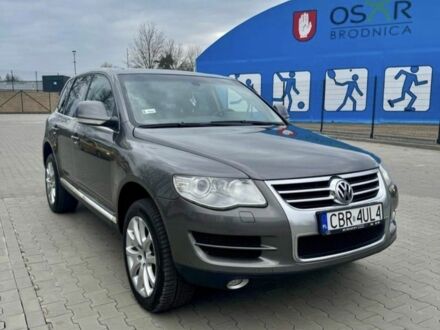 Серый Фольксваген Туарег, объемом двигателя 3 л и пробегом 260 тыс. км за 3100 $, фото 1 на Automoto.ua