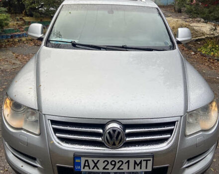 Серый Фольксваген Туарег, объемом двигателя 3 л и пробегом 236 тыс. км за 10500 $, фото 1 на Automoto.ua