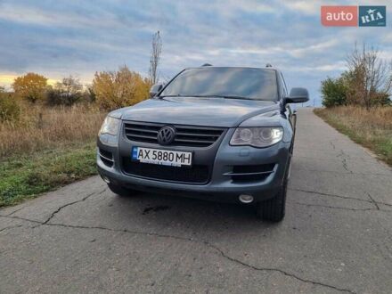 Сірий Фольксваген Туарег, об'ємом двигуна 3 л та пробігом 306 тис. км за 14800 $, фото 1 на Automoto.ua