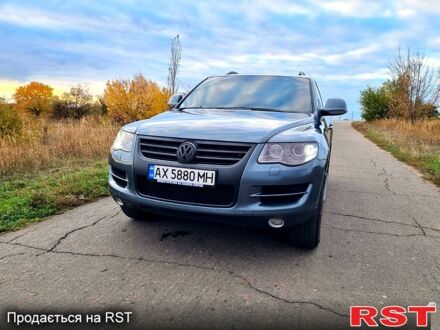 Сірий Фольксваген Туарег, об'ємом двигуна 3 л та пробігом 306 тис. км за 14800 $, фото 1 на Automoto.ua