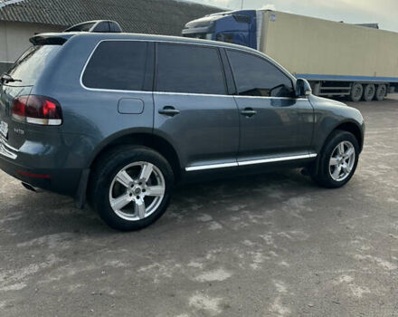 Серый Фольксваген Туарег, объемом двигателя 3 л и пробегом 265 тыс. км за 11500 $, фото 1 на Automoto.ua