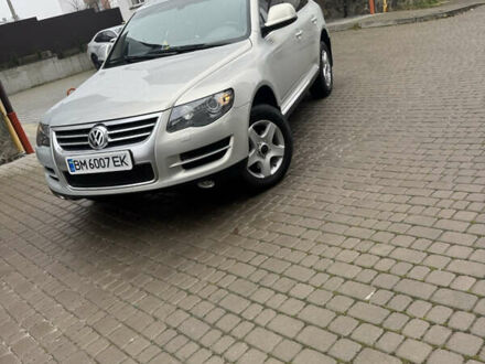 Серый Фольксваген Туарег, объемом двигателя 3 л и пробегом 369 тыс. км за 12500 $, фото 1 на Automoto.ua