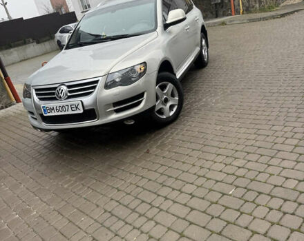 Серый Фольксваген Туарег, объемом двигателя 3 л и пробегом 369 тыс. км за 12500 $, фото 1 на Automoto.ua