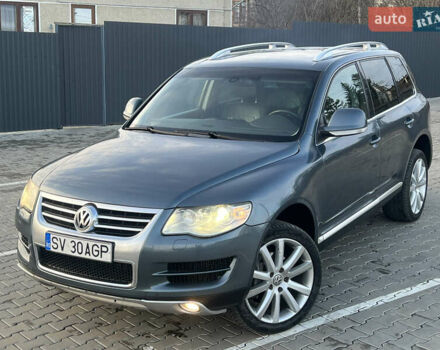 Серый Фольксваген Туарег, объемом двигателя 3 л и пробегом 260 тыс. км за 6599 $, фото 1 на Automoto.ua