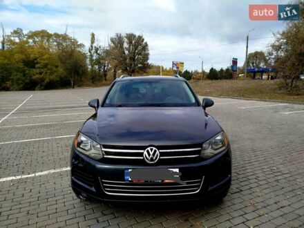 Сірий Фольксваген Туарег, об'ємом двигуна 3 л та пробігом 250 тис. км за 14500 $, фото 1 на Automoto.ua