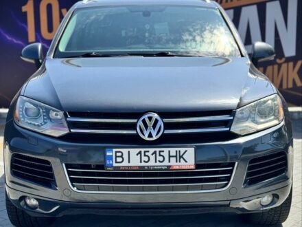 Серый Фольксваген Туарег, объемом двигателя 3 л и пробегом 460 тыс. км за 14300 $, фото 1 на Automoto.ua