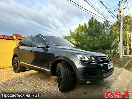 Серый Фольксваген Туарег, объемом двигателя 3 л и пробегом 130 тыс. км за 18000 $, фото 1 на Automoto.ua