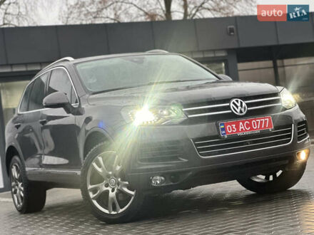 Серый Фольксваген Туарег, объемом двигателя 3 л и пробегом 298 тыс. км за 18500 $, фото 1 на Automoto.ua