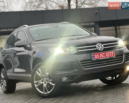 Серый Фольксваген Туарег, объемом двигателя 3 л и пробегом 298 тыс. км за 18500 $, фото 1 на Automoto.ua