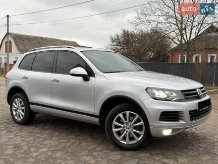 Серый Фольксваген Туарег, объемом двигателя 3 л и пробегом 197 тыс. км за 16800 $, фото 1 на Automoto.ua