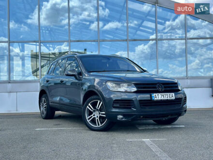 Серый Фольксваген Туарег, объемом двигателя 3 л и пробегом 226 тыс. км за 15990 $, фото 1 на Automoto.ua
