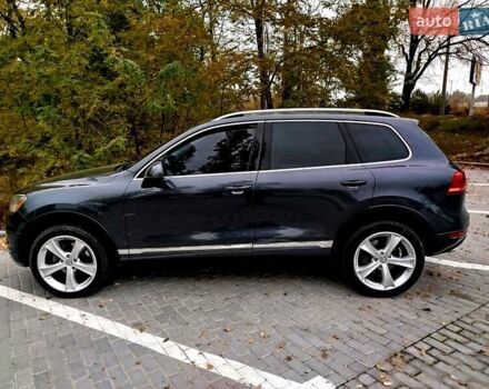 Серый Фольксваген Туарег, объемом двигателя 3 л и пробегом 255 тыс. км за 13500 $, фото 1 на Automoto.ua