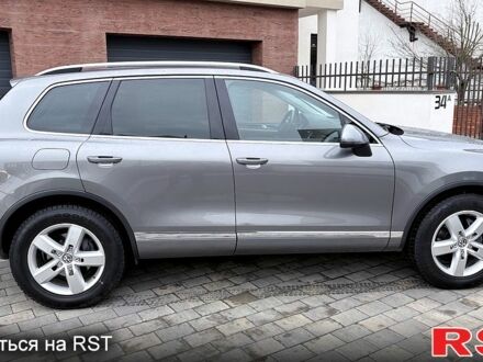 Серый Фольксваген Туарег, объемом двигателя 3 л и пробегом 290 тыс. км за 15599 $, фото 1 на Automoto.ua