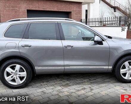 Сірий Фольксваген Туарег, об'ємом двигуна 3 л та пробігом 290 тис. км за 15599 $, фото 1 на Automoto.ua