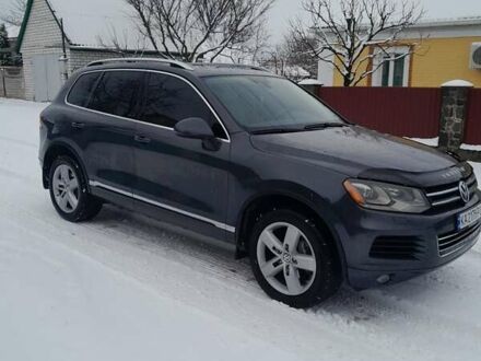 Сірий Фольксваген Туарег, об'ємом двигуна 3 л та пробігом 297 тис. км за 14500 $, фото 1 на Automoto.ua