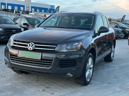 Сірий Фольксваген Туарег, об'ємом двигуна 3 л та пробігом 296 тис. км за 14490 $, фото 1 на Automoto.ua