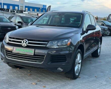 Серый Фольксваген Туарег, объемом двигателя 3 л и пробегом 296 тыс. км за 14490 $, фото 1 на Automoto.ua
