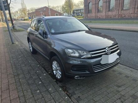Сірий Фольксваген Туарег, об'ємом двигуна 3 л та пробігом 238 тис. км за 2248 $, фото 1 на Automoto.ua