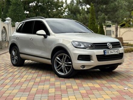 Серый Фольксваген Туарег, объемом двигателя 3 л и пробегом 270 тыс. км за 16000 $, фото 1 на Automoto.ua