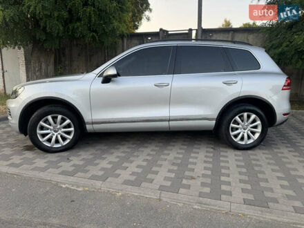 Серый Фольксваген Туарег, объемом двигателя 2.97 л и пробегом 340 тыс. км за 15900 $, фото 1 на Automoto.ua