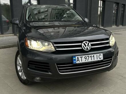 Серый Фольксваген Туарег, объемом двигателя 2.97 л и пробегом 210 тыс. км за 18500 $, фото 1 на Automoto.ua