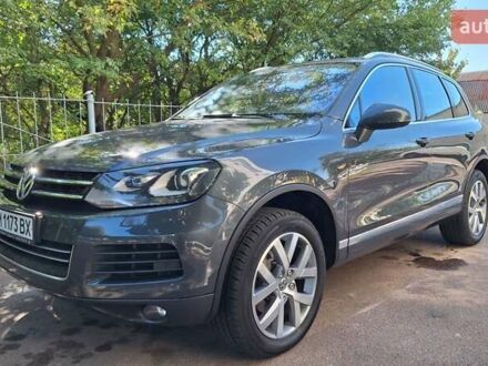 Сірий Фольксваген Туарег, об'ємом двигуна 3 л та пробігом 235 тис. км за 25000 $, фото 1 на Automoto.ua