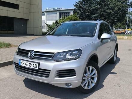 Серый Фольксваген Туарег, объемом двигателя 3 л и пробегом 280 тыс. км за 22500 $, фото 1 на Automoto.ua