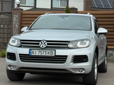 Сірий Фольксваген Туарег, об'ємом двигуна 3 л та пробігом 226 тис. км за 18000 $, фото 1 на Automoto.ua