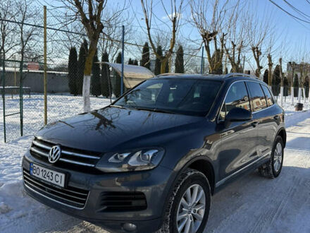 Серый Фольксваген Туарег, объемом двигателя 2.97 л и пробегом 254 тыс. км за 20900 $, фото 1 на Automoto.ua