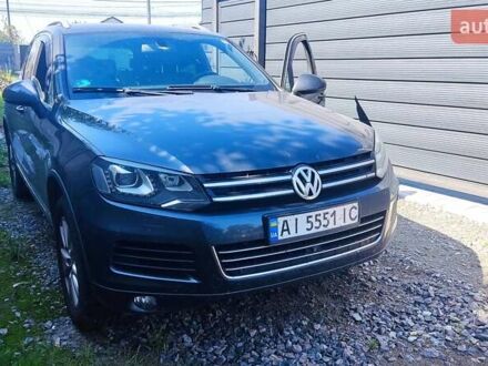 Серый Фольксваген Туарег, объемом двигателя 3 л и пробегом 319 тыс. км за 17500 $, фото 1 на Automoto.ua