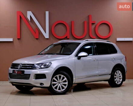 Серый Фольксваген Туарег, объемом двигателя 3 л и пробегом 219 тыс. км за 17900 $, фото 1 на Automoto.ua