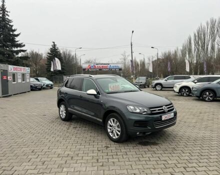 Серый Фольксваген Туарег, объемом двигателя 3 л и пробегом 223 тыс. км за 19500 $, фото 1 на Automoto.ua