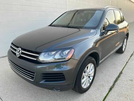 Сірий Фольксваген Туарег, об'ємом двигуна 3 л та пробігом 93 тис. км за 16800 $, фото 1 на Automoto.ua
