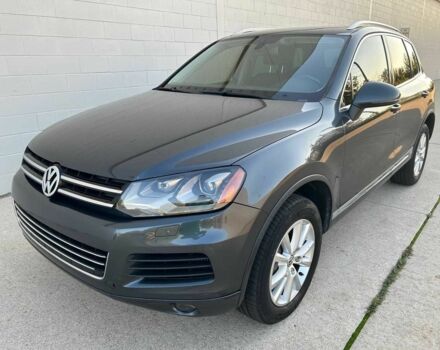 Серый Фольксваген Туарег, объемом двигателя 3 л и пробегом 93 тыс. км за 16800 $, фото 1 на Automoto.ua