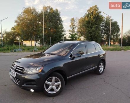 Сірий Фольксваген Туарег, об'ємом двигуна 2.97 л та пробігом 335 тис. км за 17000 $, фото 1 на Automoto.ua
